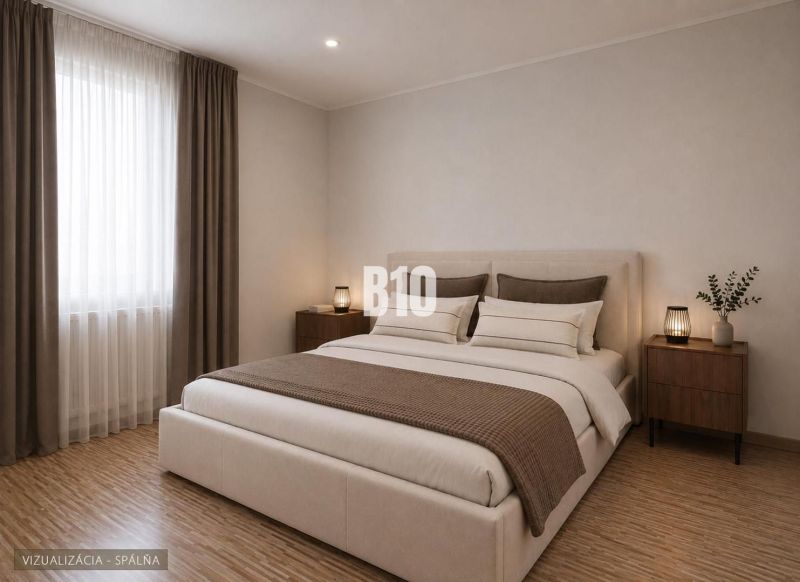 A bedroom in a three-room apartment with light walls and a floor with a wooden decor.