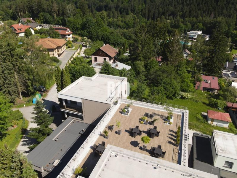 Rooftop terrace with garden furniture on M. R. Štefánik Street in Rajecké Teplice.