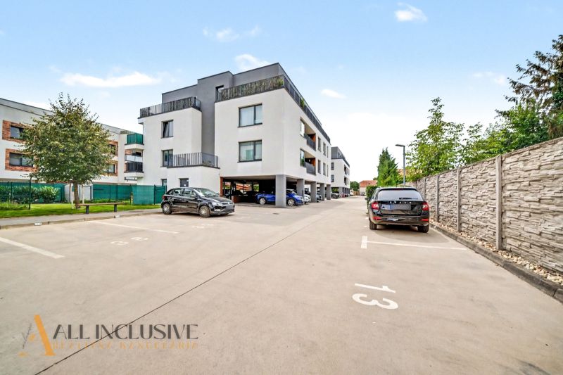 A new building on Na piesku street in Bratislava - Nové Mesto, with parking spaces.