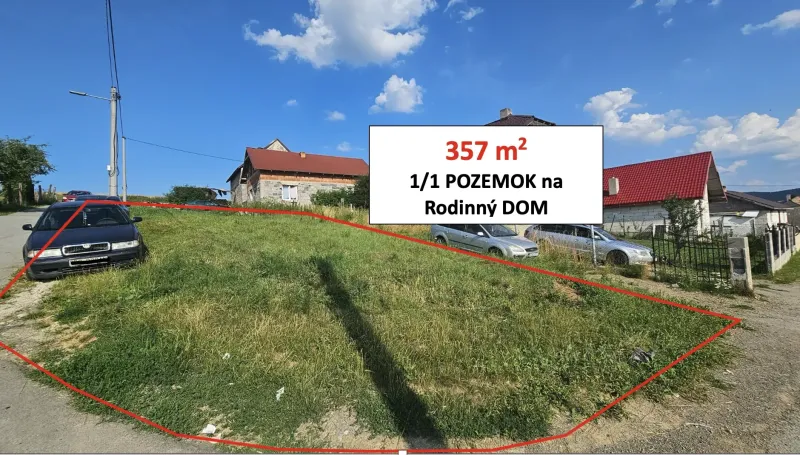 A grassy plot in Raslavice marked for construction purposes - residential.