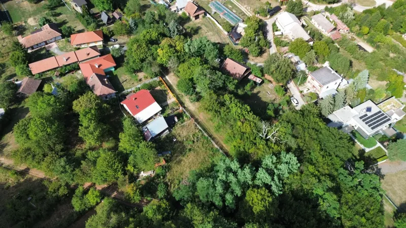 The village landscape of Kolačna is dotted with trees and picturesque buildings in the Gardens.