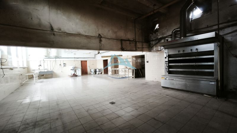 Production premises with tiles, equipment, and machinery suitable for baking.