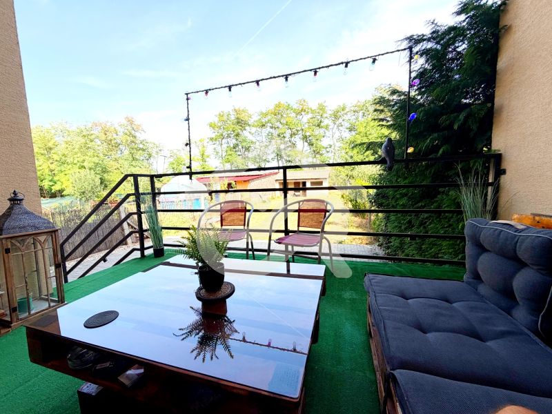 The terrace of a family house in Lúčnica nad Žitavou in Vajka nad Žitavou with comfortable seating.