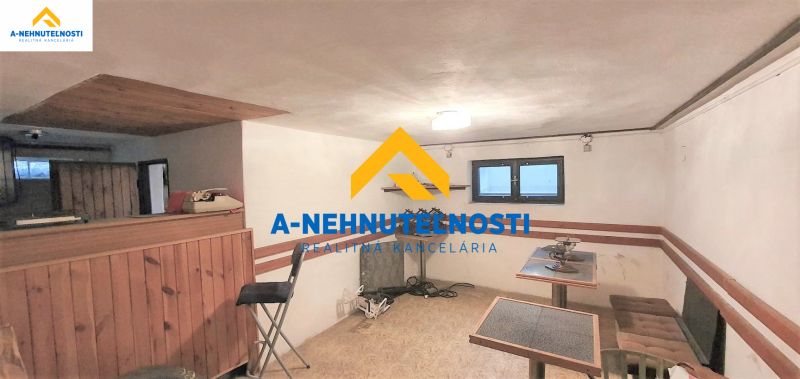 Interior of a family house with wooden paneling and storage spaces.