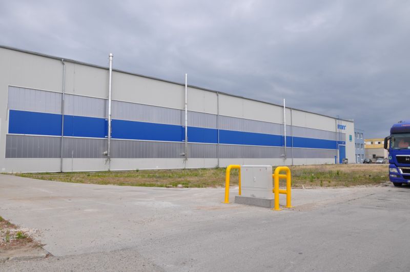 Production premises on Priemyselná Street in Galanta with a blue-gray design and a truck.