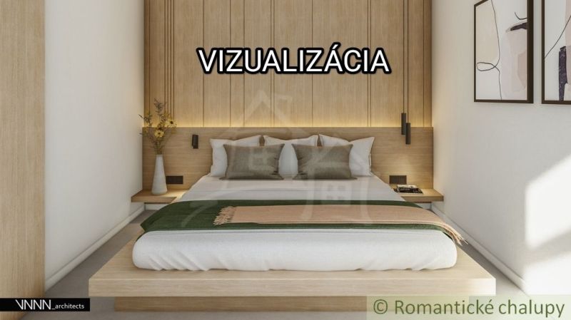 A bedroom in a family house with wooden decor and simple furnishings.