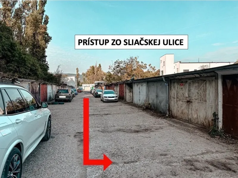 Garages in Bratislava - Nové Mesto on Sliačska Street, lined with parked cars.