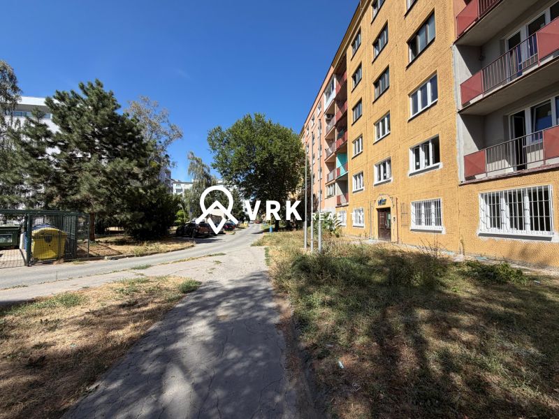 Apartment building on Stromová Street in Košice, Old Town district, surrounded by greenery.