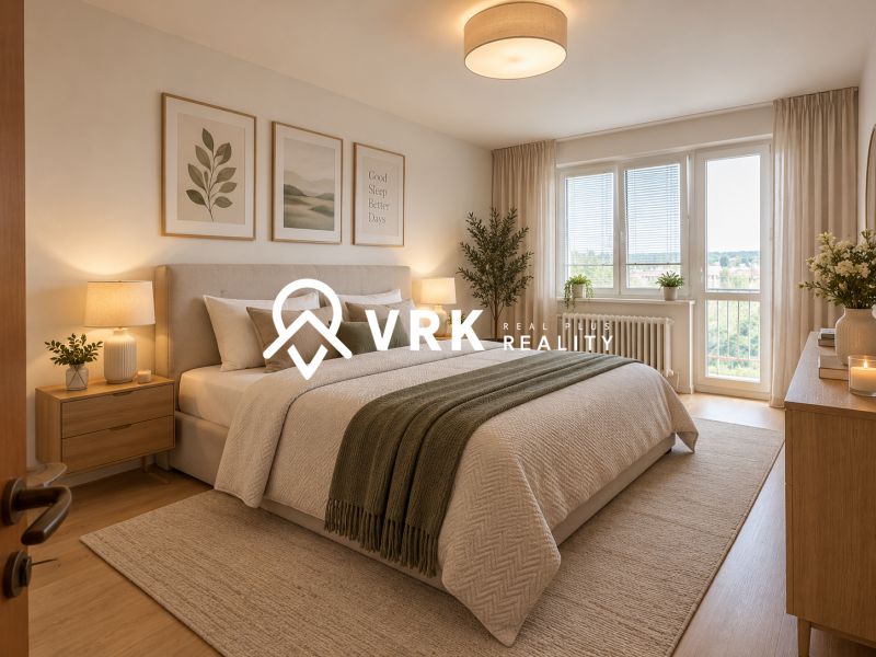 Bright bedroom in a 2-room apartment with a bed and decorations on a wooden-decor floor.