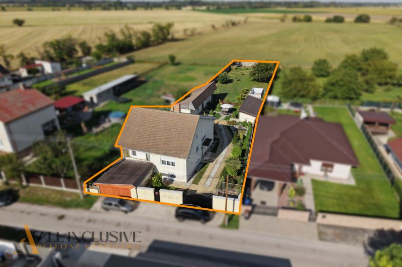 A family house on Vojtechovce Street in Nový Život with a garden and a driveway.