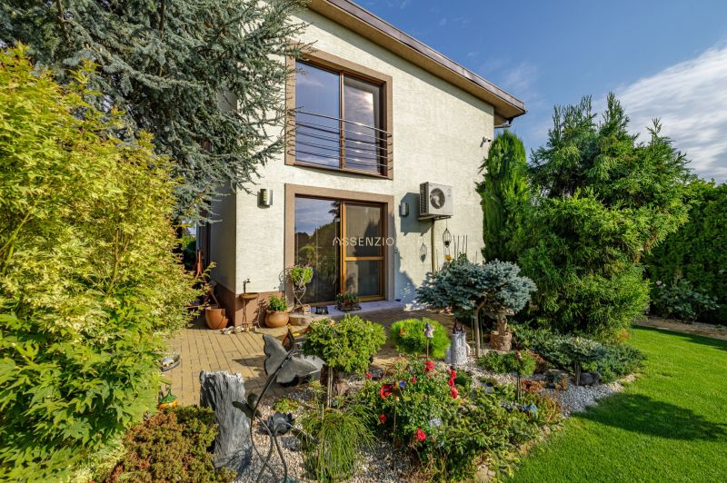 A family house on Majerská Street in Nová Dedinka with a colorful garden and terrace.