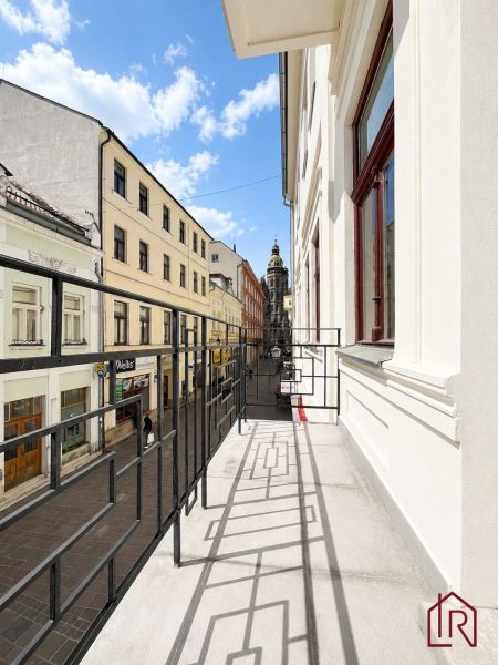 Balcony with a view of Mlynská Street, Košice - Staré Mesto district, in front of the offices.
