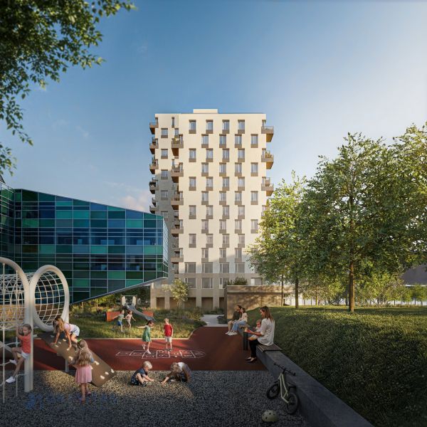 Apartment building with glass panels and a children's playground on Mlynské Nivy in Bratislava - Ružinov.