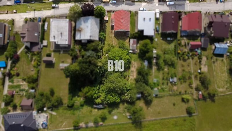 Aerial view of gardens and family houses in Považská Bystrica.