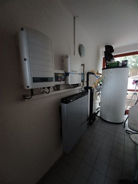 Technical room in a family house with the installation of energy devices.