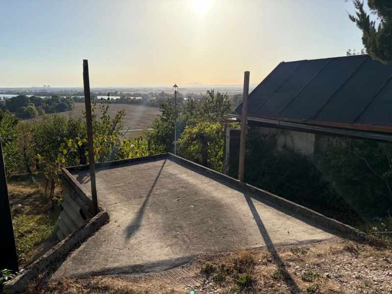 The view from the cottage in the town of Banka of the surrounding landscape at sunset.
