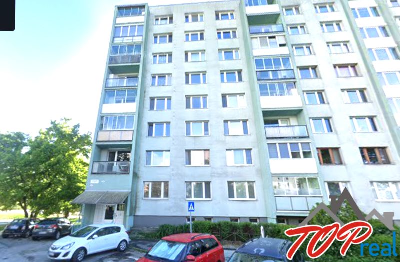 Apartment building on Ostravská Street in Košice, Juh district, with a parking lot.