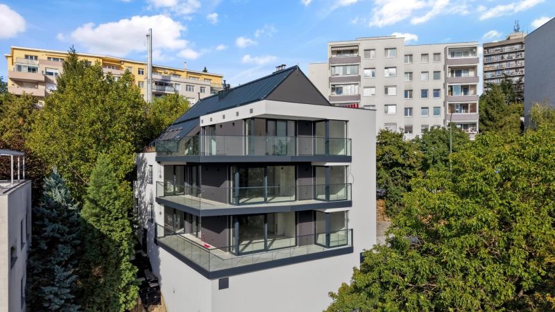Building with glass balconies on Bartók Street in Bratislava - Old Town.