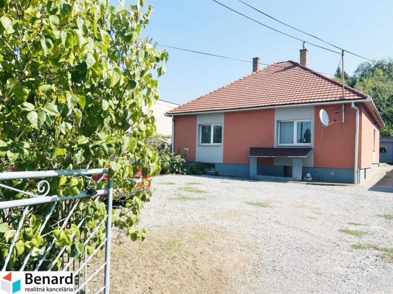 A family house on Sabinovská Street in Prešov with a landscaped yard and garden.