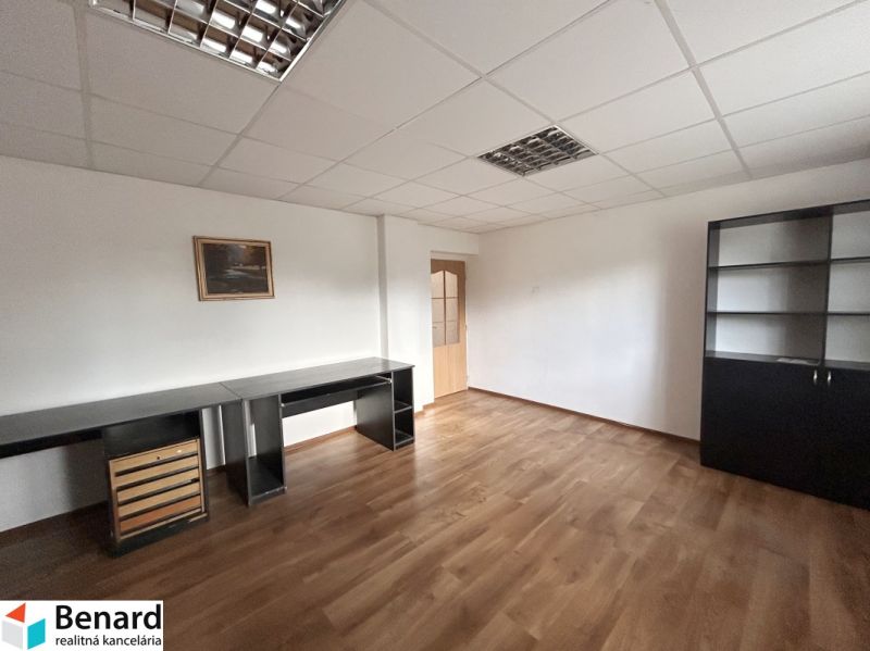 Office in a family house with a wooden decor floor and furniture.