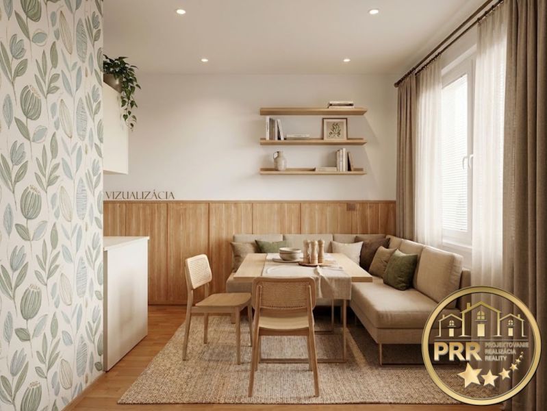 Living room in a two-room apartment with natural decorations and light wooden elements.