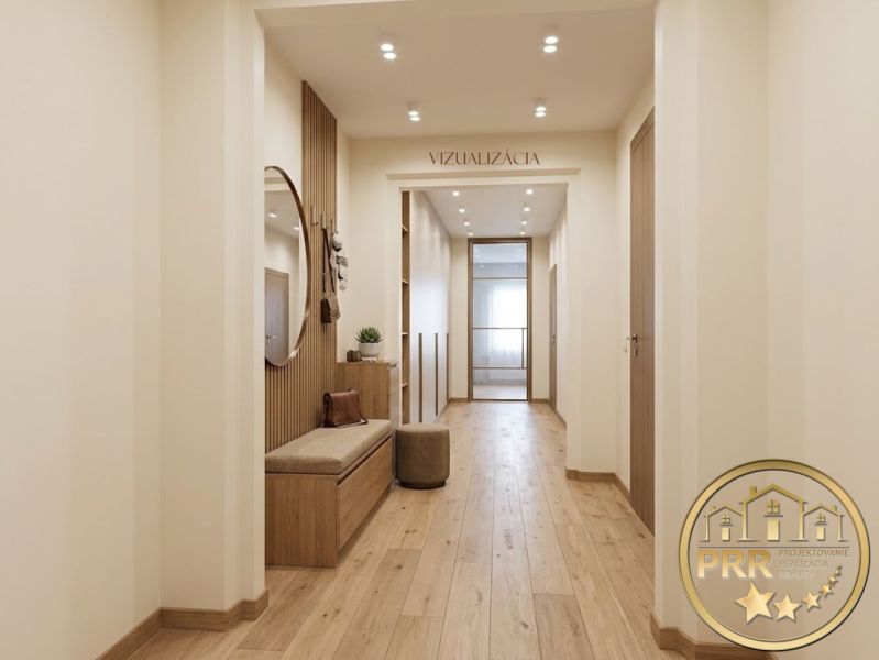 A hallway in a 2-room apartment with a wooden decor floor and a bench under a round mirror.