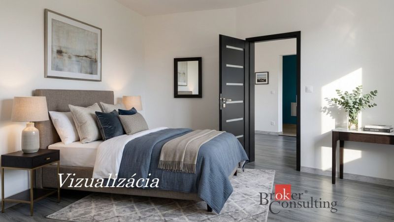 Bedroom with a bed, carpet, lamps, and wooden decor flooring in a studio apartment.