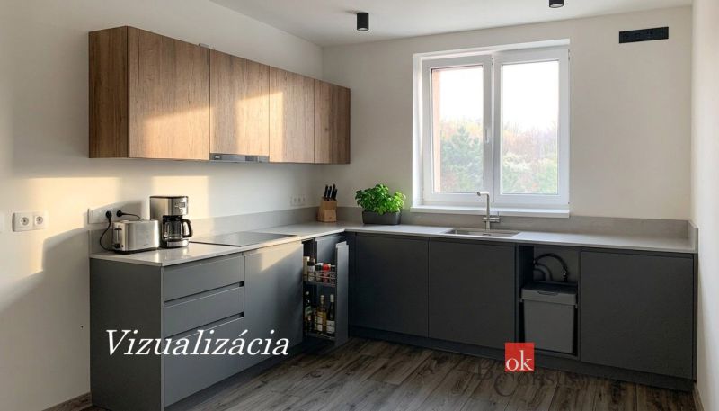 A kitchen in a one-room apartment with a wooden decor floor and a kitchen unit.