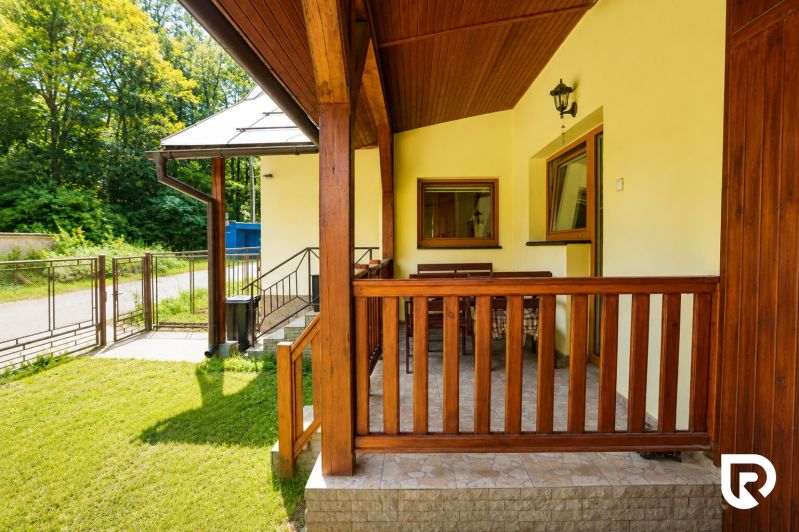 A family house in Čierne in Makov with a terrace and yard in a summer setting.