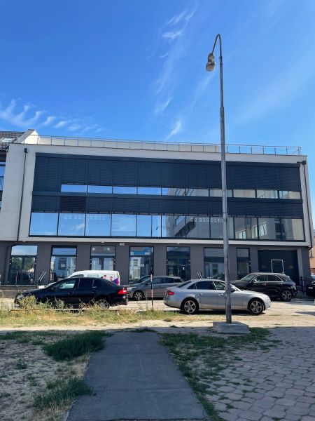 Commercial premises at Komenského 2A 2B in Levice with modern glass surfaces.