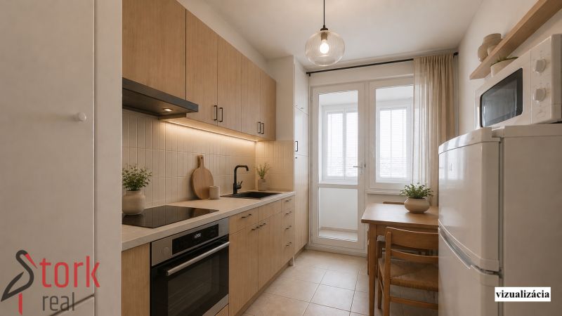 A kitchen in a 2-room apartment with a wooden decor floor and a dining table.