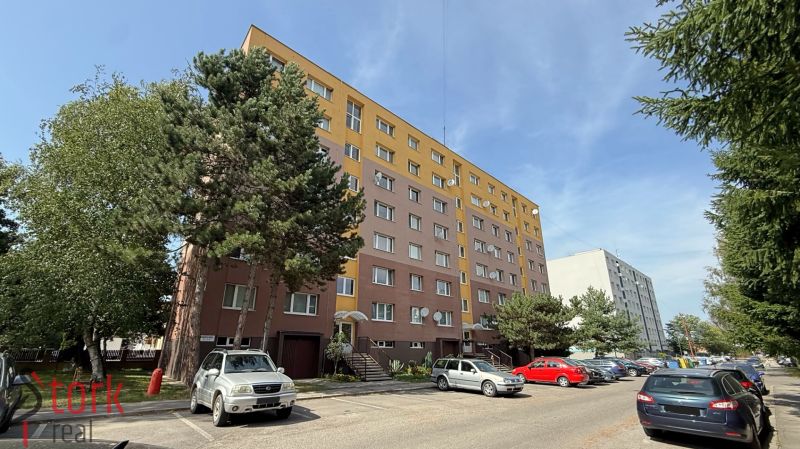 Mudrochova Street in Rajec shows an apartment building and a parking lot for 2-bedroom apartments.