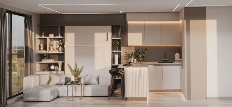 Interior of a family house with a kitchen, living area, and wooden decor flooring.