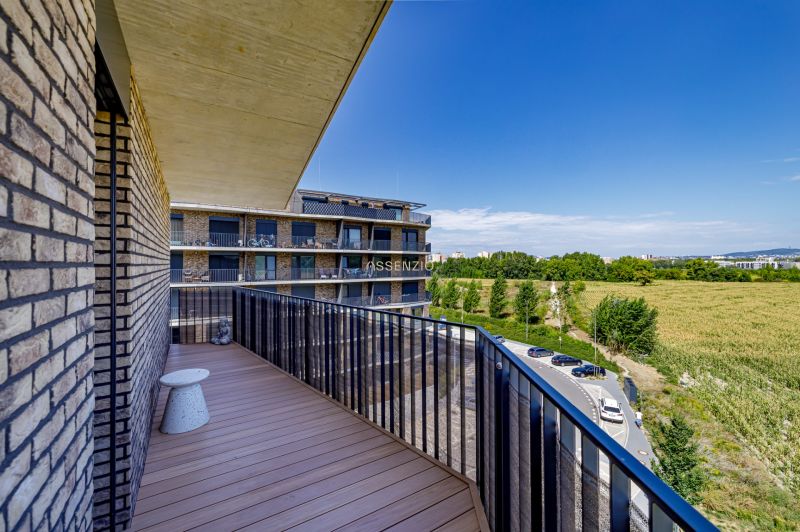 A balcony with a view of nature on Fialová Street in Bratislava - Petržalka.