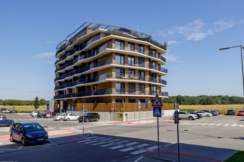 High-rise building with garage parking in Petržalka on Fialová, Bratislava.