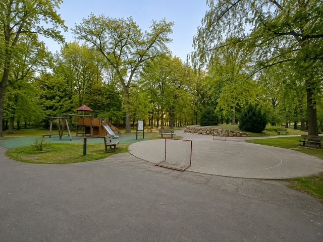 Playground and play area on Nobelova Street in Bratislava surrounded by trees.