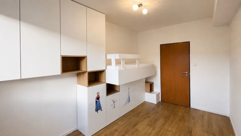 Children's room with a bunk bed, storage space, and a floor with a wooden decor.
