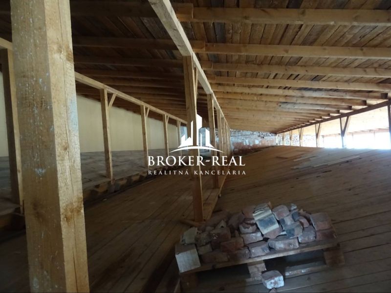 Attic space with wooden beams and flooring with a wooden decor, Warehouses and halls.