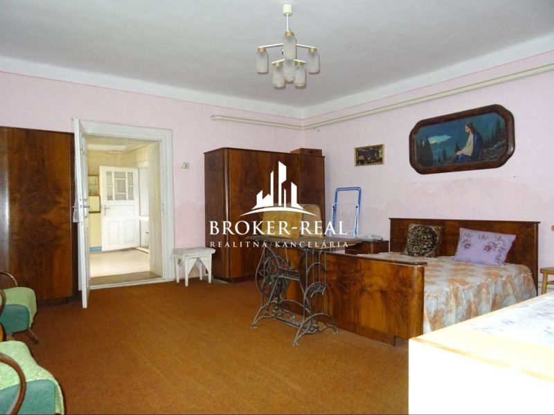 Interior of a family house with retro furniture and textile accessories.