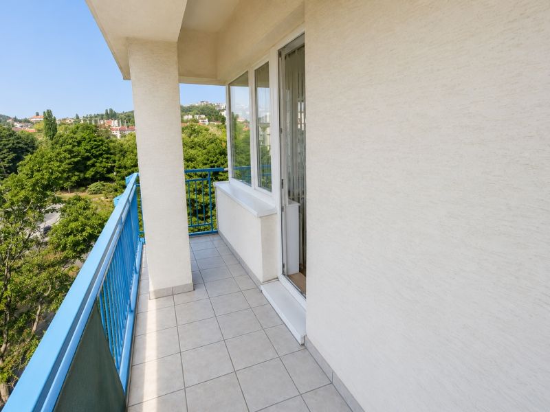 A balcony of a 2-room apartment with a view of greenery at Račianske mýto, Bratislava - Ahoj.