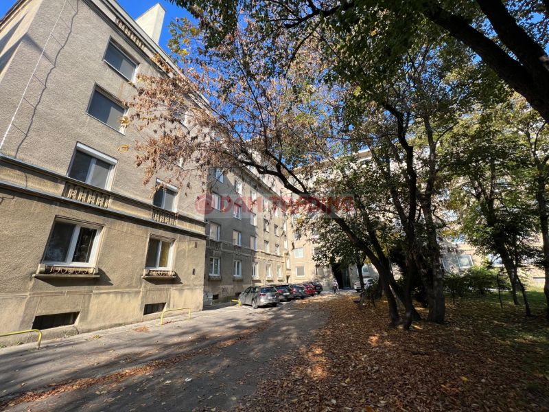 Apartment building on Miletičova Street in Bratislava - Ružinov, surrounded by trees and cars.