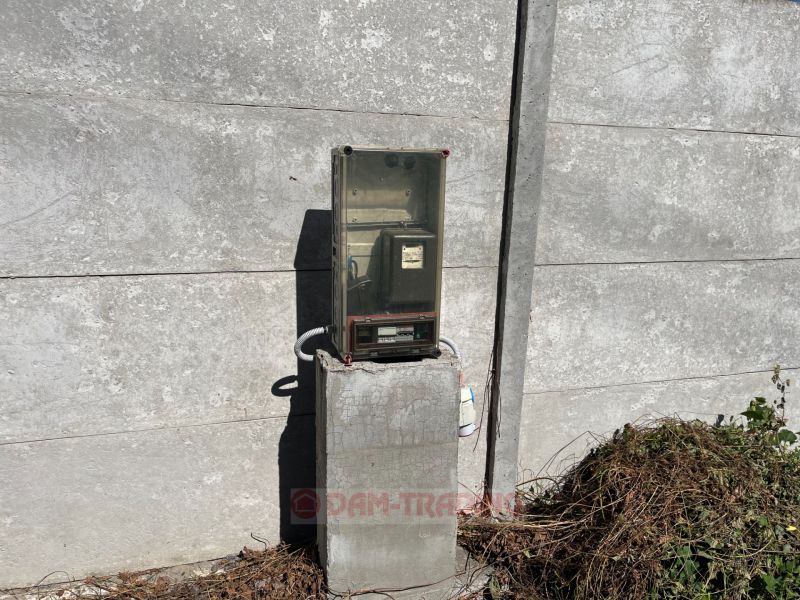 In the Gardens on Galvaniho in Bratislava - Ružinov, there is a concrete wall with an electricity meter.