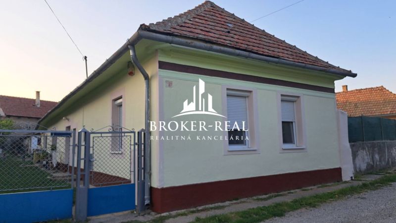 A family house in Gönc with a classic pitched roof and colorful facade.
