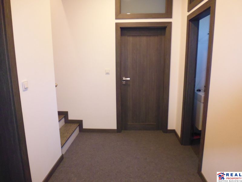 Interior doors with a dark frame in warehouses and halls.