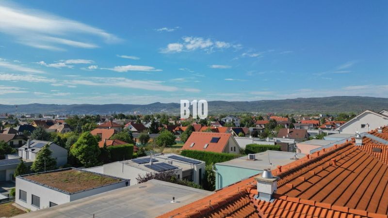View of rooftops and hills from a 2-room apartment in Bratislava III.