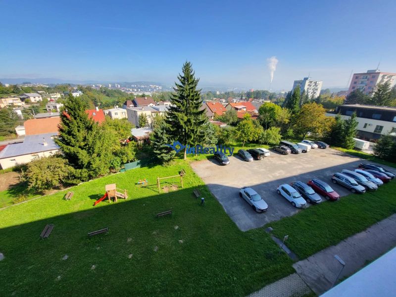 View from Gagarin Street in Zvolen to the parking lot and playground.