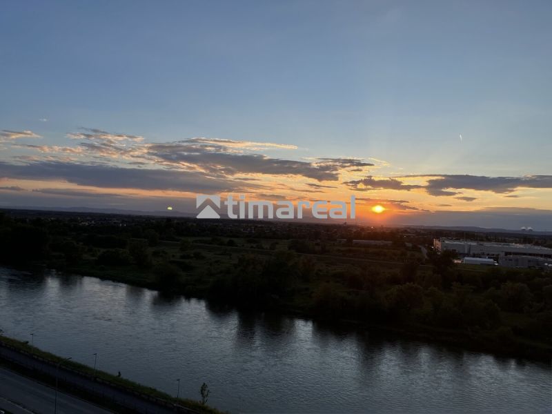 A view of the sunset from Manckovičova Street in Hlohovec by the river.