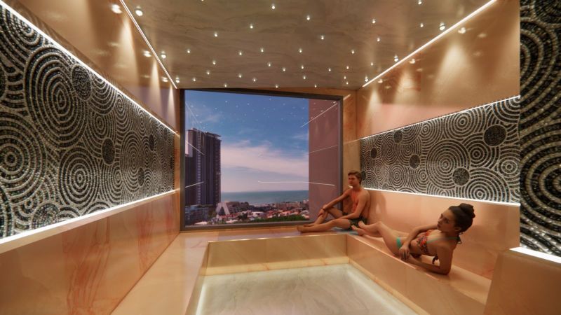 Relaxation room in a recreational apartment with a view of the city and ocean in Jomtien.