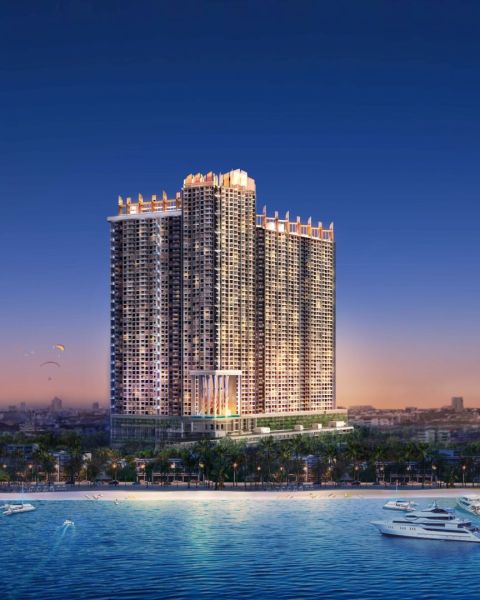 Recreational apartment in Jomtien by the sea with a harbor and evening sky.
