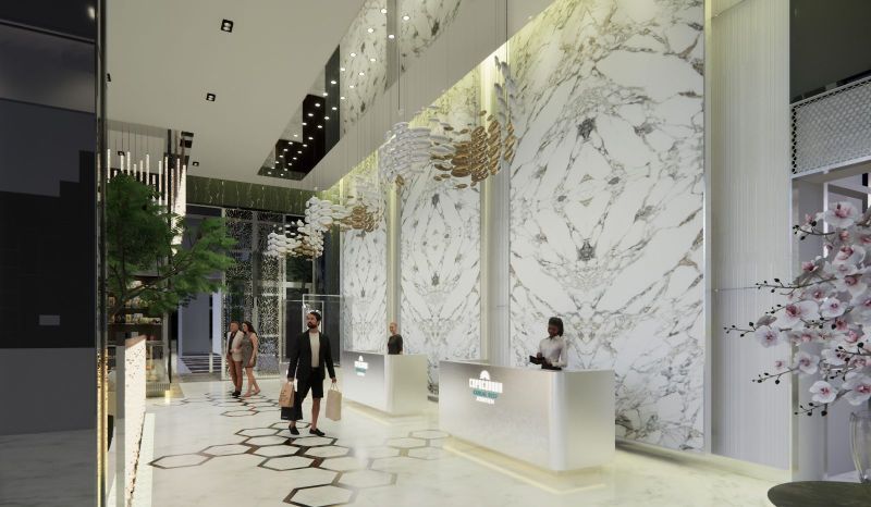 Reception of a recreational apartment with marble walls and modern lighting.